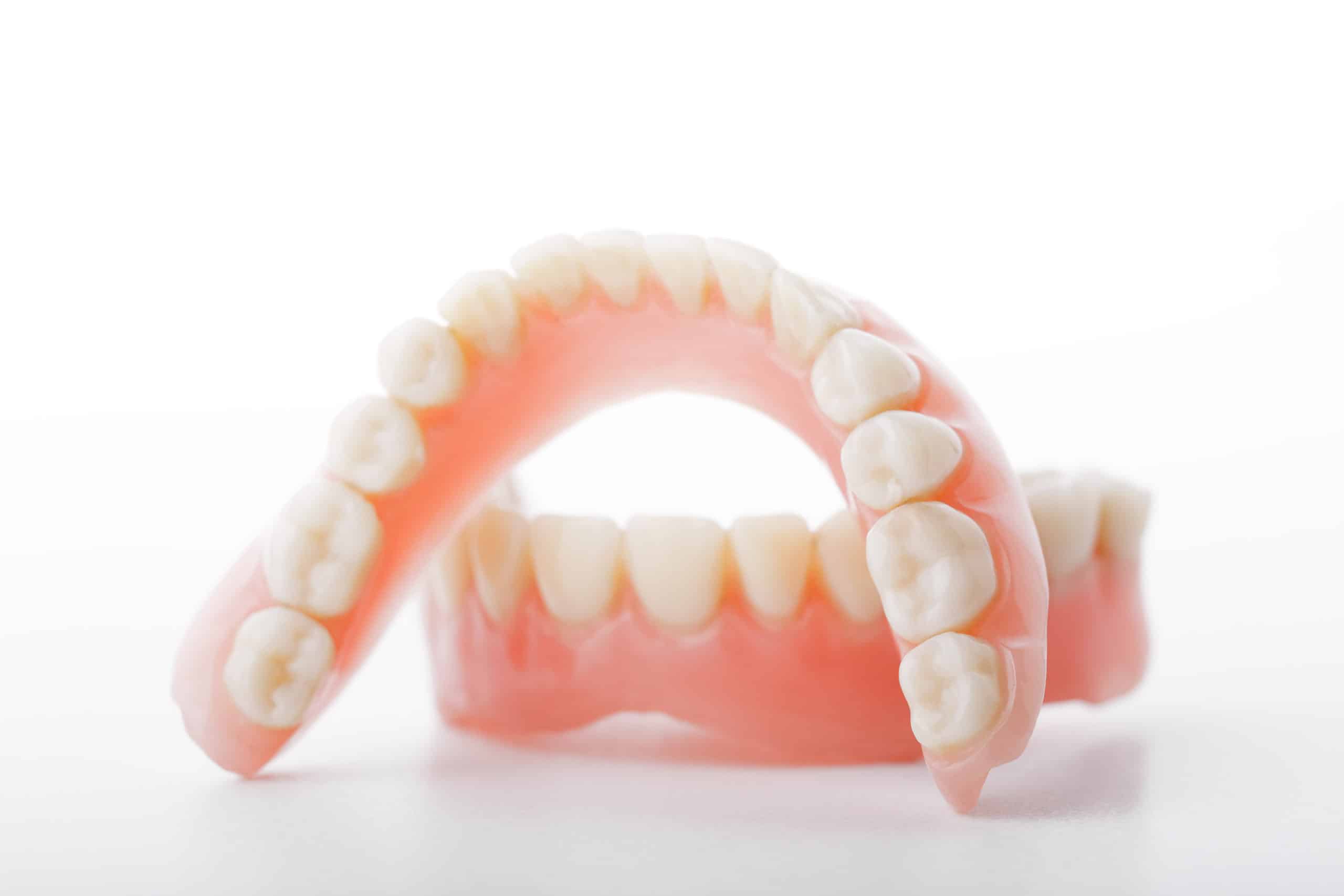 dentures vs dental implants
